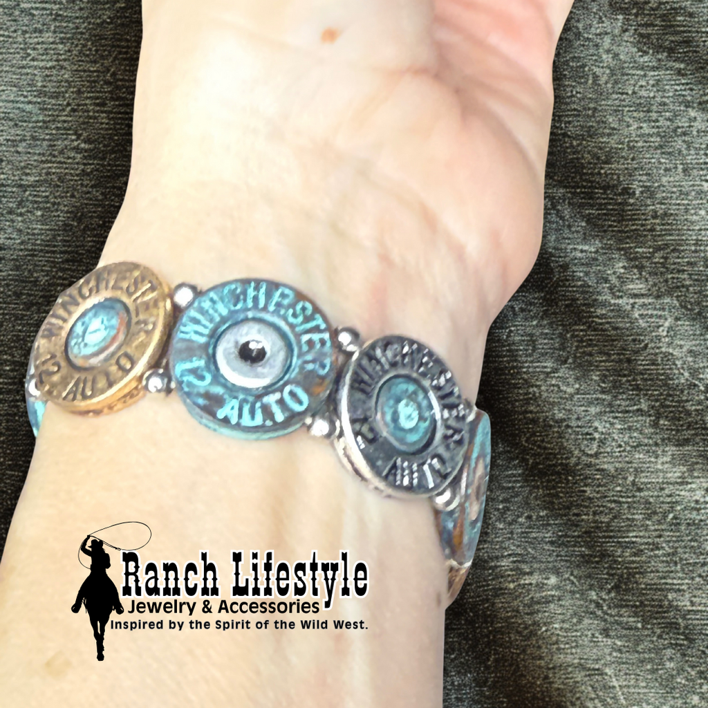 Bracelet with bullet casing design on a wrist, featuring 'Ranch Lifestyle' branding.